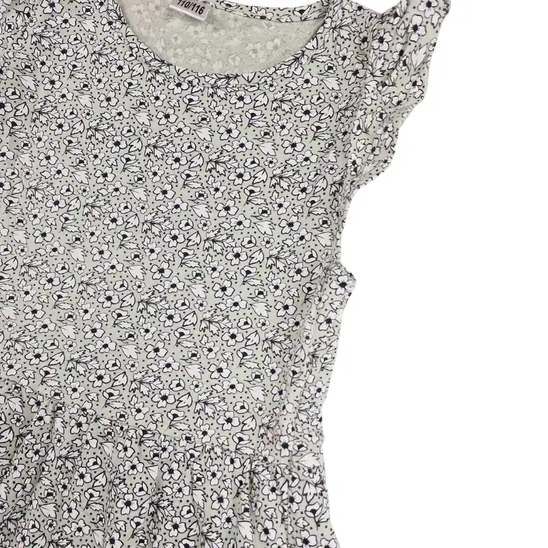 Robe Sans marque 5/6 ans – Fond vert à fleurs blanches et noires – Image 2